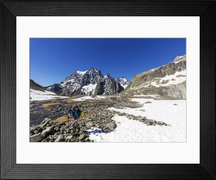 Framed Print : Hiker on a mountain trail, Barre des Ecrins, Ecrins National Park, French Dauphine Alps Framed Print : Hiker on a mountain trail, Barre des Ecrins, Ecrins National Park, French Dauphine Alps