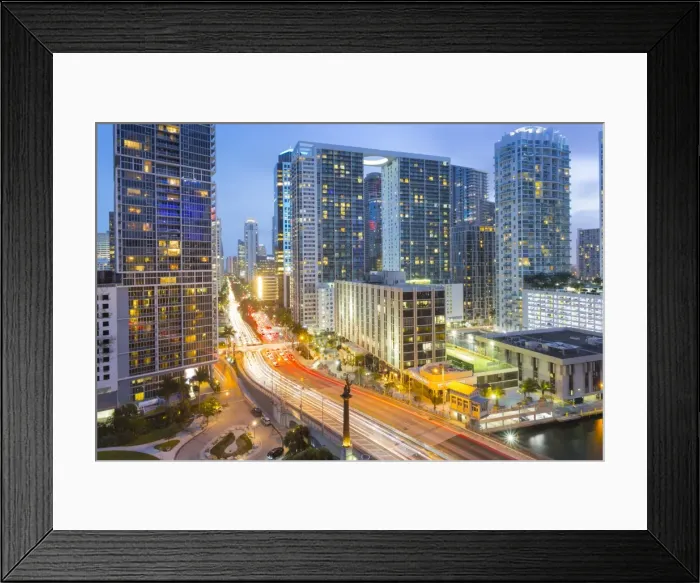 Framed Print : View from Rooftop bar overlooking traffic on Birckell Avenue at dusk, Miami, Florida