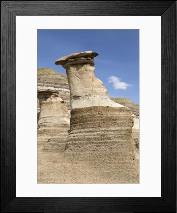 Framed Print : The hoodoos, rock formations formed by the erosion of Bentonite, in the Badlands Framed Print : The hoodoos, rock formations formed by the erosion of Bentonite, in the Badlands