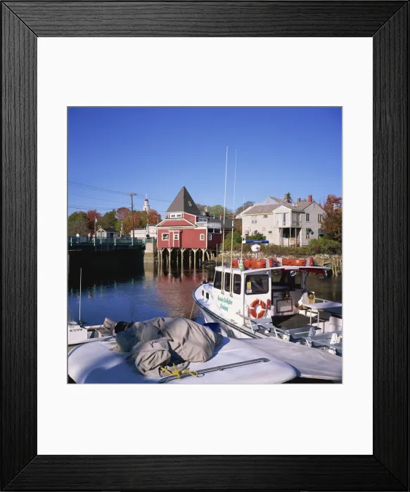 Framed Print : Cruise boat in harbour with wooden buildings on the waterfront Framed Print : Cruise boat in harbour with wooden buildings on the waterfront