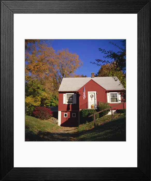 Framed Print : Red wooden house with American flag