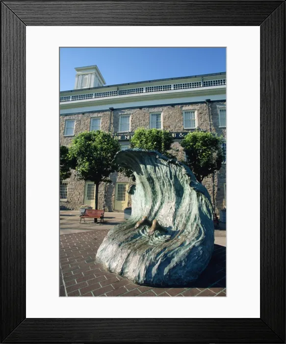 Framed Print : Sculpture depicting someone diving into a wave Framed Print : Sculpture depicting someone diving into a wave