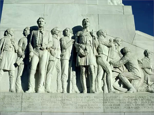 Close-up of sculptures of Travis and Crockett on the