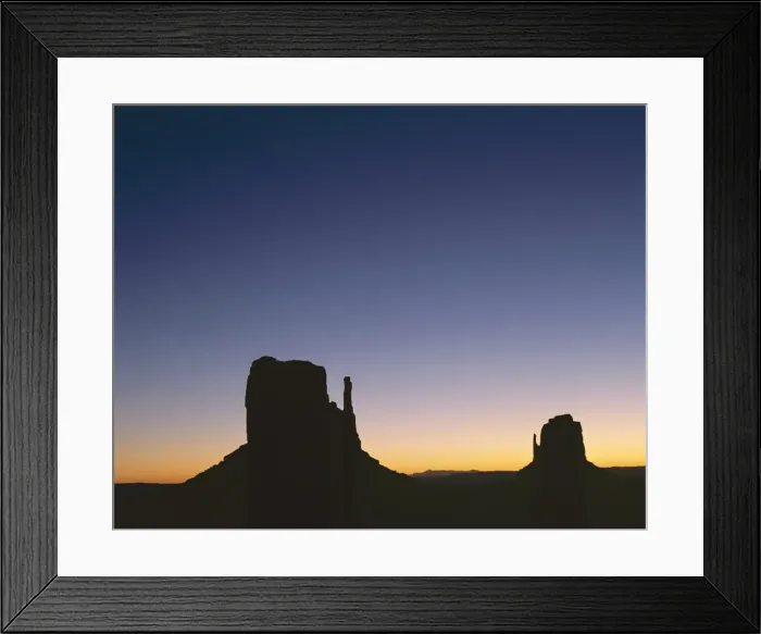 Framed Print : Silhouettes of mitten rock formations at sunset Framed Print : Silhouettes of mitten rock formations at sunset