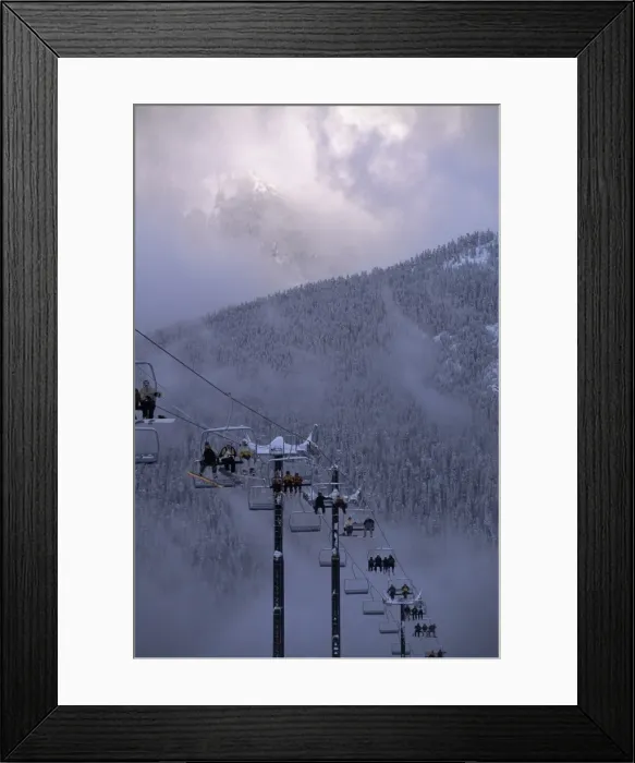 Framed Print : Chair lift filled with skiers and snowboarders Framed Print : Chair lift filled with skiers and snowboarders