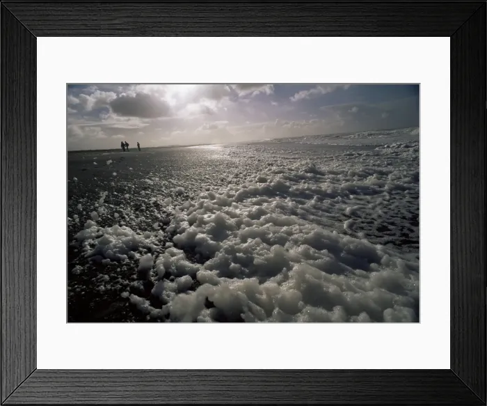 Framed Print : Foam off the Pacific Ocean on coast near Westport