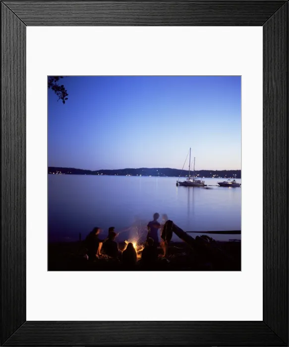 Framed Print : Friends around beach fire