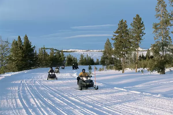 Snowmobiling in the western area of Yellowstone National Park