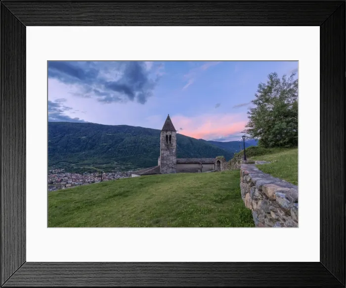 Framed Print : Old bell tower of the Xenodochio of Santa Perpetua at sunrise, Tirano, province of Sondrio Framed Print : Old bell tower of the Xenodochio of Santa Perpetua at sunrise, Tirano, province of Sondrio
