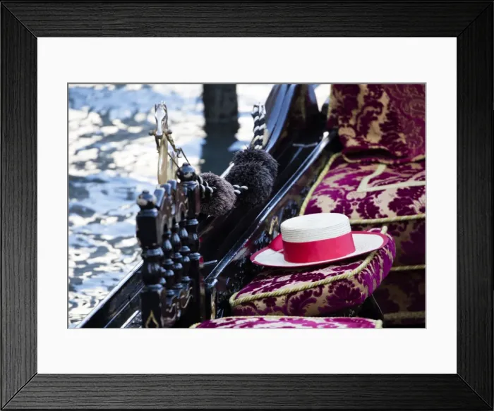Framed Print : Detail of traditional Venetian Gondola showing Gondoliers straw hat, Venice, Veneto