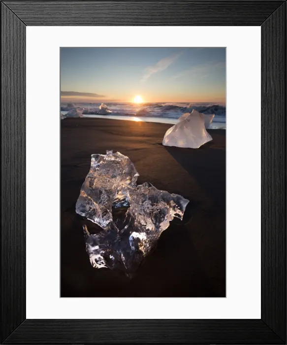 Framed Print : Glassy pieces of ice on volcanic black sand beach at sunrise, near Jokulsarlon Lagoon Framed Print : Glassy pieces of ice on volcanic black sand beach at sunrise, near Jokulsarlon Lagoon