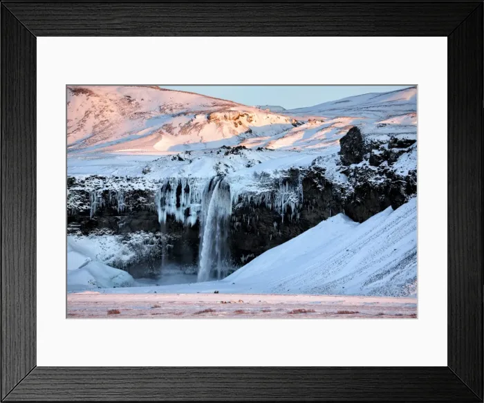 Framed Print : Winter view of Seljalandsfoss Waterfall bathed in evening light, South Iceland, Polar Framed Print : Winter view of Seljalandsfoss Waterfall bathed in evening light, South Iceland, Polar