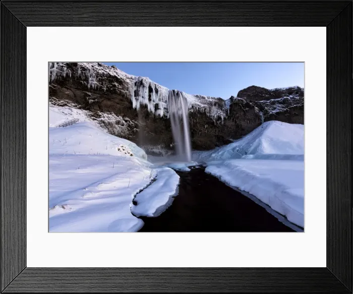 Framed Print : Winter view of Seljalandsfoss Waterfall at dusk with snow covered foreground Framed Print : Winter view of Seljalandsfoss Waterfall at dusk with snow covered foreground