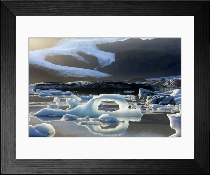 Framed Print : Ice arch among icebergs floating on Fjallsarlon lagoon, near Jokulsarlon, South Iceland Framed Print : Ice arch among icebergs floating on Fjallsarlon lagoon, near Jokulsarlon, South Iceland
