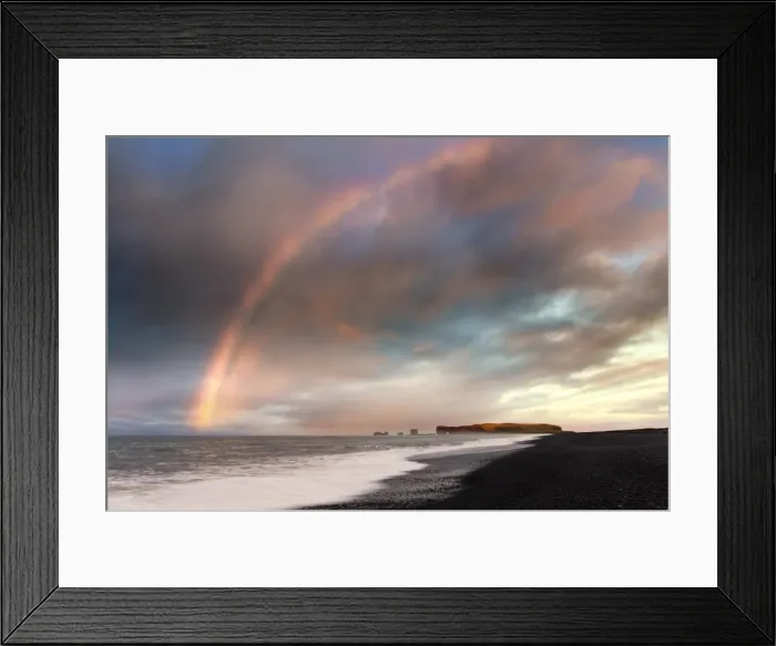 Framed Print : Distant view of Dyrholaey at sunrise with rainbow, from Halsanefs Hellir Beach near Vik Framed Print : Distant view of Dyrholaey at sunrise with rainbow, from Halsanefs Hellir Beach near Vik