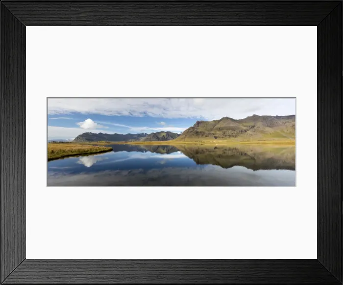 Framed Print : Panoramic view of mountains and blue sky reflecting in lake, near Vik, South Iceland Framed Print : Panoramic view of mountains and blue sky reflecting in lake, near Vik, South Iceland