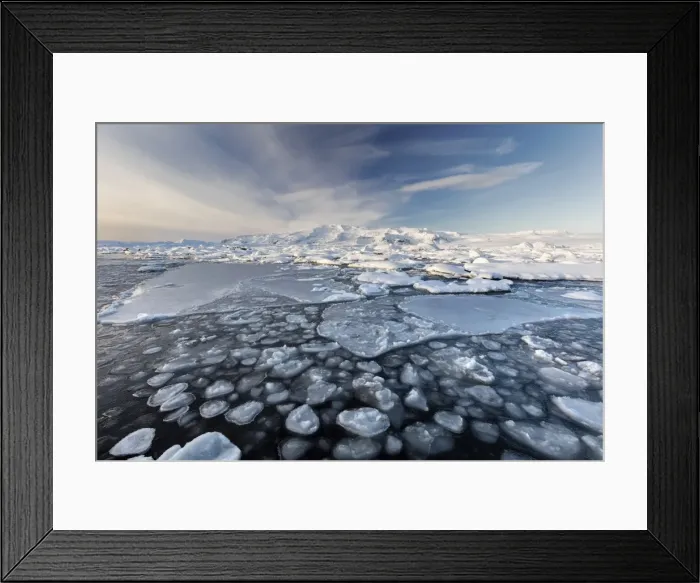 Framed Print : Frozen Jokulsarlon Glacial Lagoon in winter with ice in the foreground and snow covered Framed Print : Frozen Jokulsarlon Glacial Lagoon in winter with ice in the foreground and snow covered
