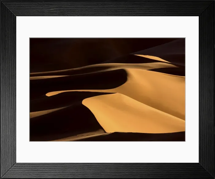 Framed Print : Shapes and shadows in dunes of the Erg Chebbi sand sea, part of the Sahara Desert near Merzouga Framed Print : Shapes and shadows in dunes of the Erg Chebbi sand sea, part of the Sahara Desert near Merzouga