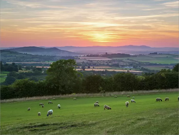 Cotswold landscape and distant Malvern Hills at sunset, Farmcote, Cotswolds, Gloucestershire