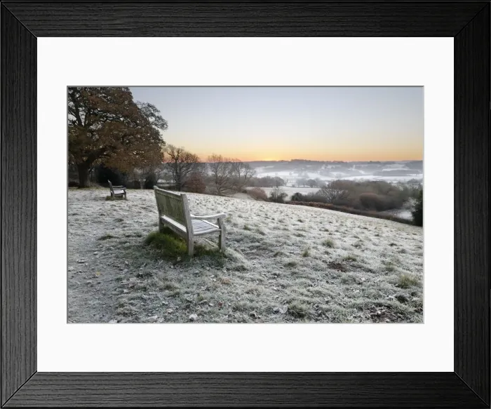 Framed Print : Wooden bench and view over Sussex landscape at sunrise in frost, Burwash, East Sussex Framed Print : Wooden bench and view over Sussex landscape at sunrise in frost, Burwash, East Sussex