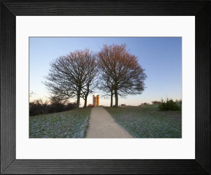 Framed Print : Broadway Tower framed by trees in winter frost at sunrise, Broadway, Cotswolds, Worcestershire Framed Print : Broadway Tower framed by trees in winter frost at sunrise, Broadway, Cotswolds, Worcestershire