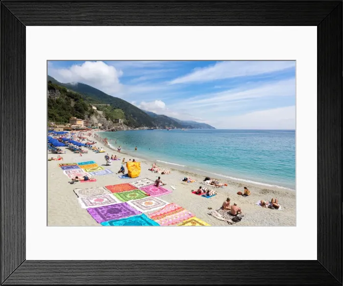 Framed Print : Blanket sellers showcasing their products on the beach at Monterosso, Cinque Terre Framed Print : Blanket sellers showcasing their products on the beach at Monterosso, Cinque Terre
