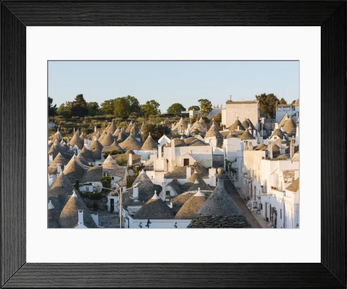 Framed Print : Traditional Trulli style houses in Alberobello, UNESCO World Heritage Site, Puglia Framed Print : Traditional Trulli style houses in Alberobello, UNESCO World Heritage Site, Puglia