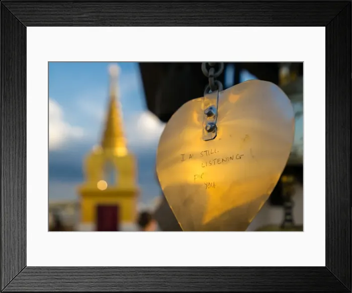 Framed Print : Golden prayer flag etching with Buddhist gold stupa in background, Bangkok, Thailand Framed Print : Golden prayer flag etching with Buddhist gold stupa in background, Bangkok, Thailand