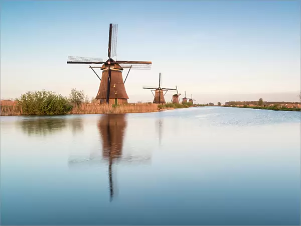 Windmills in a row on the canal, Kinderdijk, UNESCO World Heritage Site, Molenwaard municipality