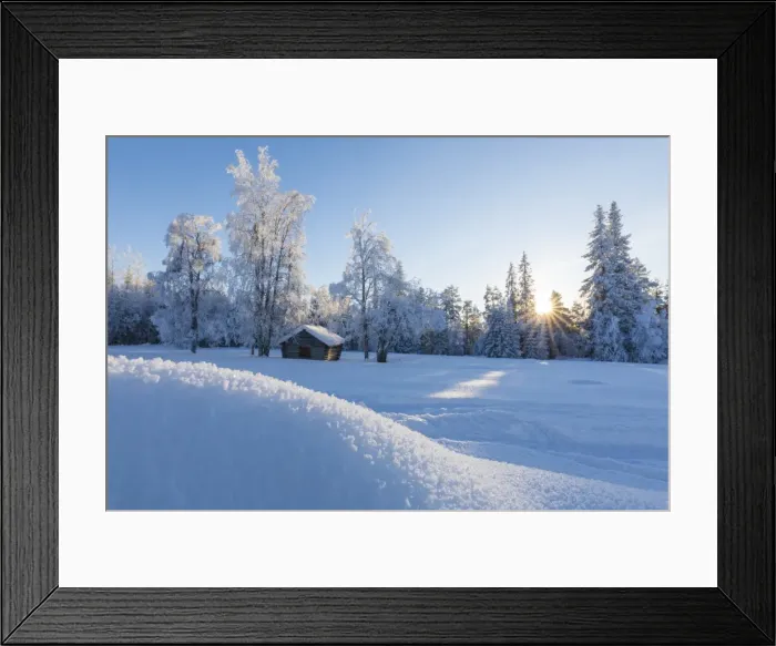 Framed Print : Sunburst on wooden hut in the snowy forest, Kiruna, Norrbotten County, Lapland, Sweden