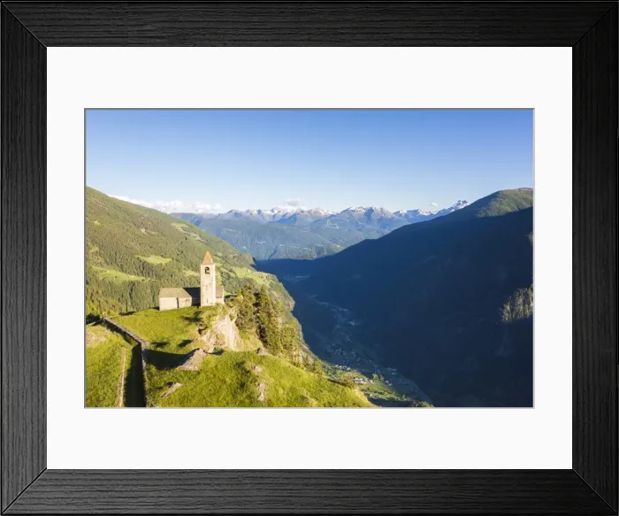 Framed Print : Ancient church perched on mountains, San Romerio Alp, Brusio, Canton of Graubunden Framed Print : Ancient church perched on mountains, San Romerio Alp, Brusio, Canton of Graubunden