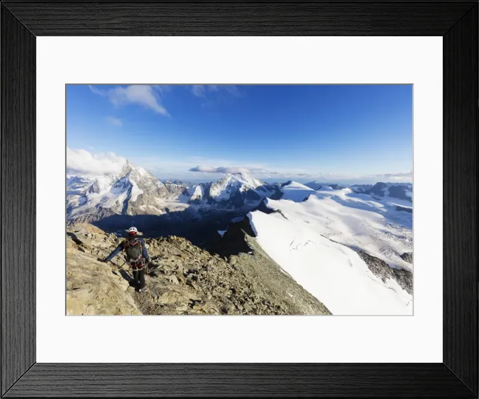 Framed Print : Climber on south ridge of Dent Blanche, 4357m, with view to the Matterhorn, Valais Framed Print : Climber on south ridge of Dent Blanche, 4357m, with view to the Matterhorn, Valais