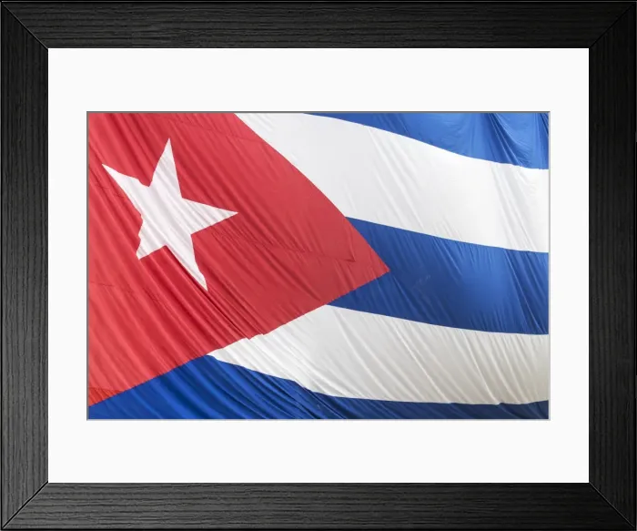 Framed Print : Cuban flag hanging across buildings in a street in Santa Clara, after the death of Fidel Castro Framed Print : Cuban flag hanging across buildings in a street in Santa Clara, after the death of Fidel Castro