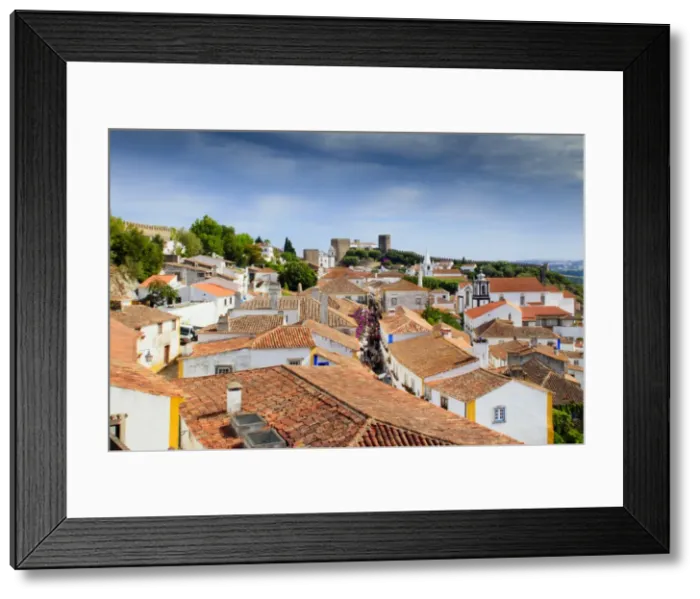 Framed Print : Streets and castle in the medieval walled village of Obidos in Portugals Centro region Framed Print : Streets and castle in the medieval walled village of Obidos in Portugals Centro region