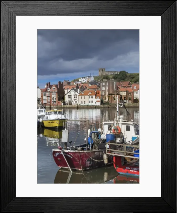 Framed Print : View of fishing boats in the harbour and the town centre, Whitby, Yorkshire, England Framed Print : View of fishing boats in the harbour and the town centre, Whitby, Yorkshire, England