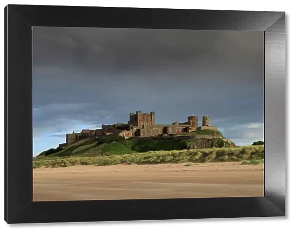 Bamburgh Castle and beach near Lindisfarne, Northumberland, England, United Kingdom