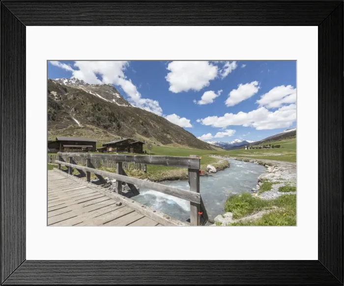 Framed Print : Wood bridge on the alpine river surrounding the village of Davos, Sertig Valley Framed Print : Wood bridge on the alpine river surrounding the village of Davos, Sertig Valley