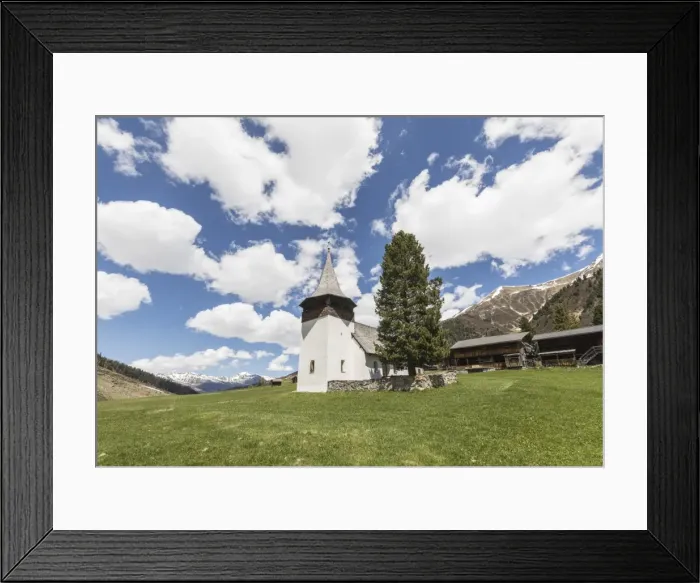 Framed Print : Ancient church of the alpine village of Davos, Sertig Valley, canton of Graubunden Framed Print : Ancient church of the alpine village of Davos, Sertig Valley, canton of Graubunden