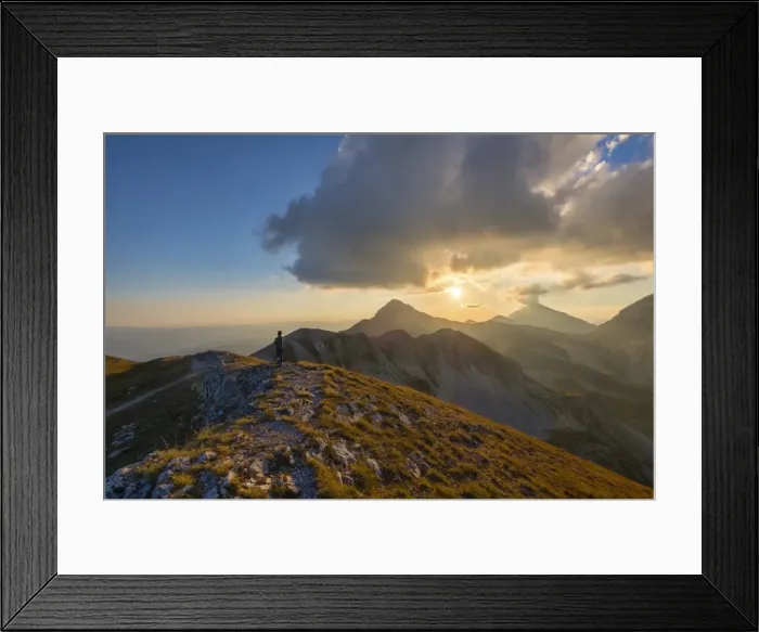 Framed Print : Hiker in front of mountain Portella at sunset, Gran Sasso e Monti della Laga National Park Framed Print : Hiker in front of mountain Portella at sunset, Gran Sasso e Monti della Laga National Park