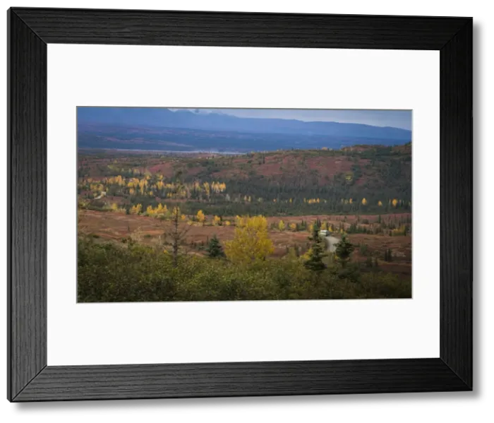 Framed Print : Camper bus driving into the wonder lake campground deep in the Denali National Park Framed Print : Camper bus driving into the wonder lake campground deep in the Denali National Park