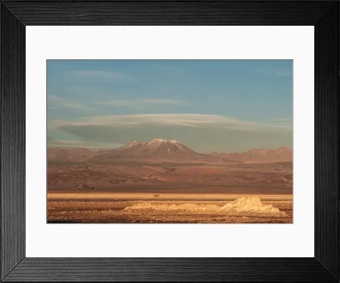 Framed Print : Hikers out on the Atacama Salt Flats, with snow-capped volcanic peak in the background Framed Print : Hikers out on the Atacama Salt Flats, with snow-capped volcanic peak in the background