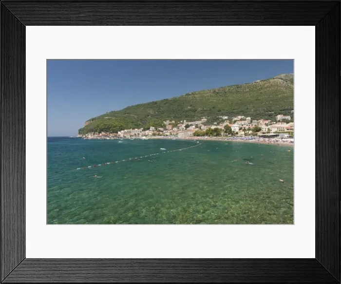 Framed Print : People swimming in Adriatic Sea, resort town of Petrovac, Montenegro, Europe Framed Print : People swimming in Adriatic Sea, resort town of Petrovac, Montenegro, Europe
