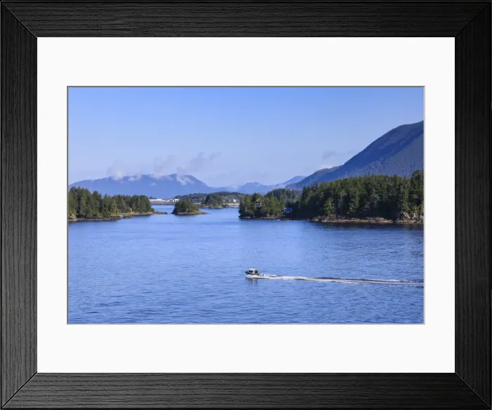 Framed Print : Boat travels through small forested islands, clearing morning mists, rare Summer sun Framed Print : Boat travels through small forested islands, clearing morning mists, rare Summer sun