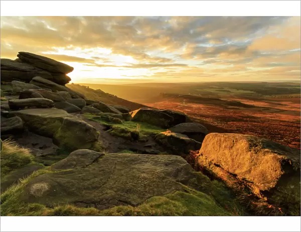Carl Wark Hill Fort and Hathersage Moor from Higger Tor, sunrise in autumn, Peak