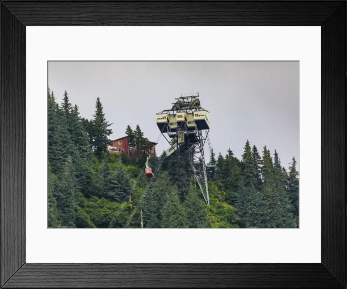 Framed Print : Mount Roberts Tramway cable car approaches top station, surrounded by forest, Juneau Framed Print : Mount Roberts Tramway cable car approaches top station, surrounded by forest, Juneau