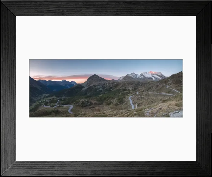 Framed Print : Panoramic of the road bends of Bernina Pass at dawn, Poschiavo Valley, Engadine Framed Print : Panoramic of the road bends of Bernina Pass at dawn, Poschiavo Valley, Engadine