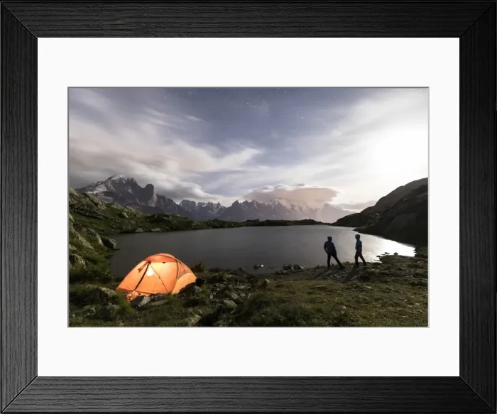 Framed Print : Hikers and tent on the shore of Lacs De Cheserys at night with Mont Blanc massif in the background Framed Print : Hikers and tent on the shore of Lacs De Cheserys at night with Mont Blanc massif in the background