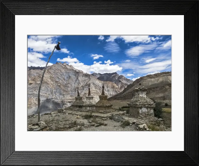 Framed Print : Weathered Buddhist chortens at Neyrak village looking over cliff, Zanskar, India Framed Print : Weathered Buddhist chortens at Neyrak village looking over cliff, Zanskar, India