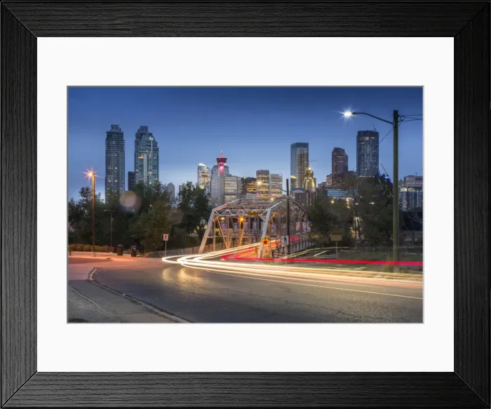 Framed Print : Car trail lights through Macdonal Avenue bridge and Downtown skyline at dusk, Calgary Framed Print : Car trail lights through Macdonal Avenue bridge and Downtown skyline at dusk, Calgary
