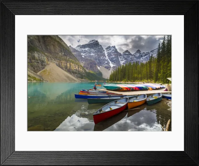 Framed Print : Tranquil setting of rowing boats on Moraine Lake, Banff National Park, UNESCO World Heritage Site Framed Print : Tranquil setting of rowing boats on Moraine Lake, Banff National Park, UNESCO World Heritage Site